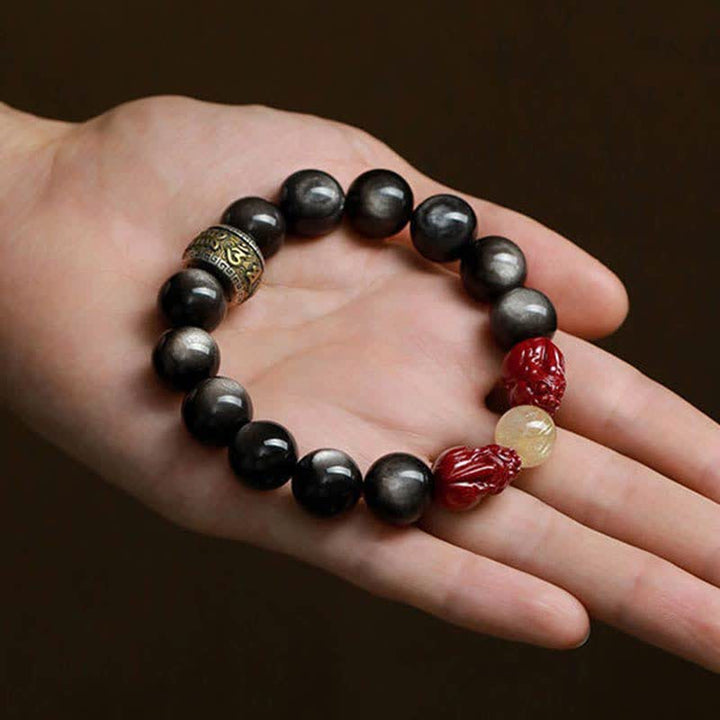 Braccialetto di protezione Om Mani Padme Hum in ossidiana lucida dorata Buddha Stones PiXiu Cinnabar