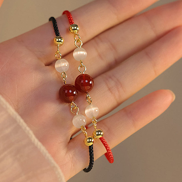 Braccialetto di fiducia in corda intrecciata con occhio di gatto e agata rossa Buddha Stones - image 9