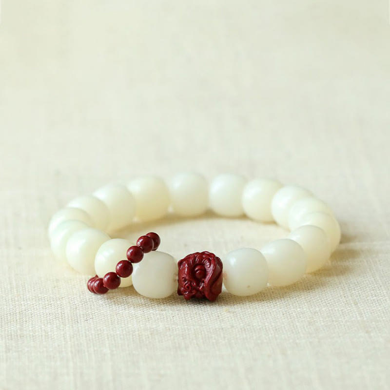 Buddha Stones Semi di Bodhi naturale Cinabro Leone danzante Charm Saggezza Armonia Polso Mala - Seme di Bodhi (Saggezza♥ Tieni lontani gli spiriti maligni) - image 0