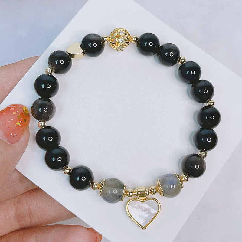 Braccialetto di protezione con cuore, stella e fiore in ossidiana naturale con Buddha Stones argento lucido
