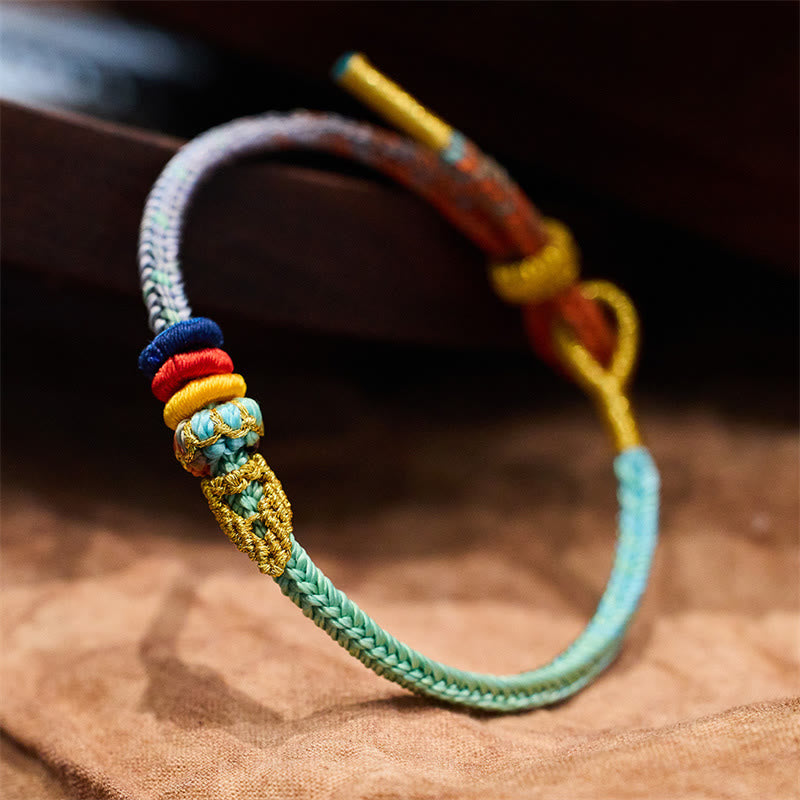 Braccialetto fatto a mano con nodo della pace , Buddha Stones, corda colorata, otto fili, fortuna - Turchese e blu (circonferenza polso 14-19 cm) - image 0