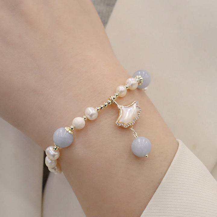 Braccialetto con ciondolo a forma di farfalla con foglia di ginkgo e perle di acquamarina naturale Buddha Stones