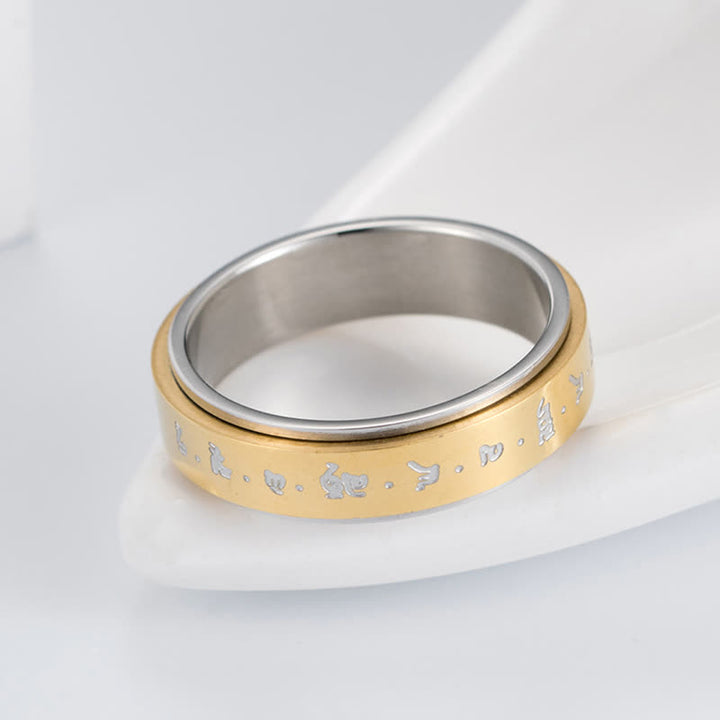 Anello girevole in acciaio al titanio con mantra Buddha Stones