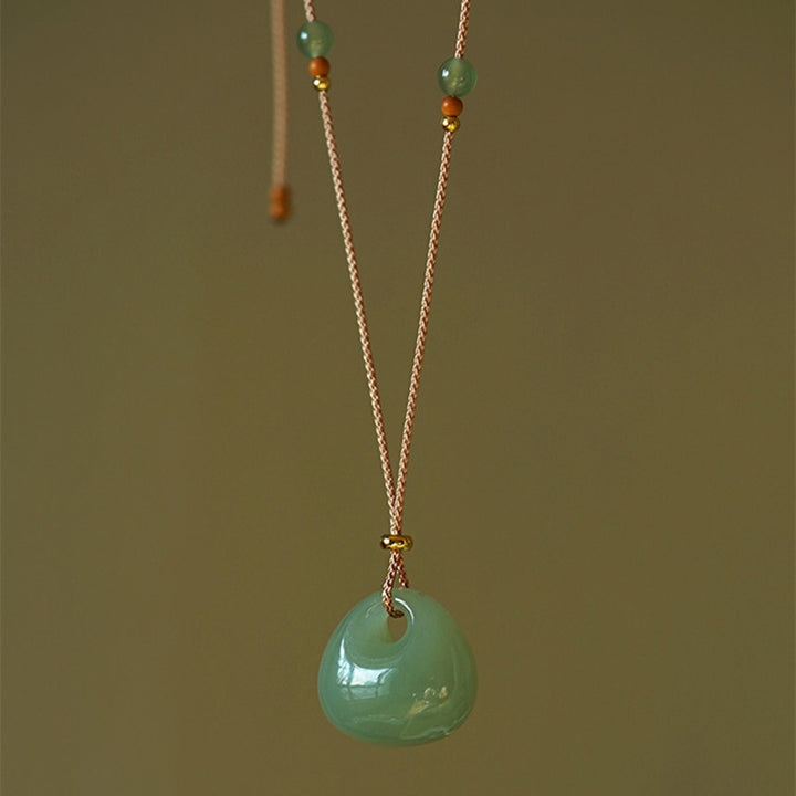 Collana con ciondolo portafortuna e prosperità in giada naturale Buddha Stones. - image 7
