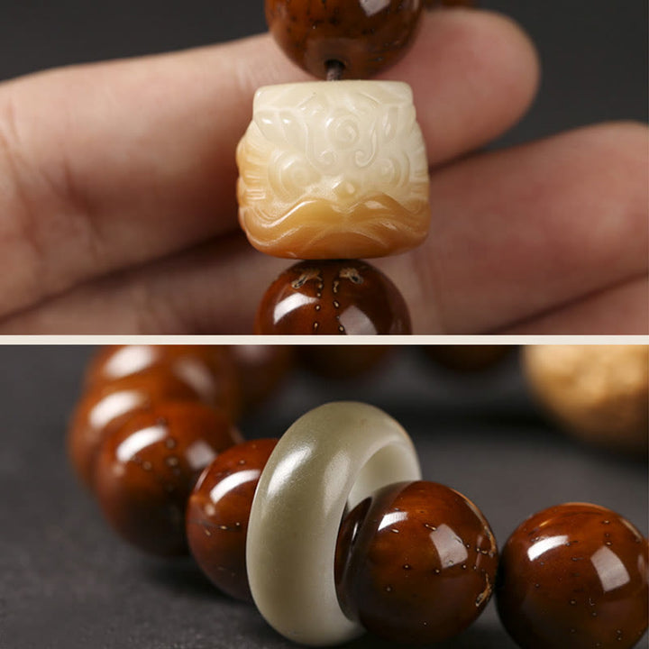 Braccialetto della saggezza del leone danzante dei semi di Bodhi viola Buddha Stones