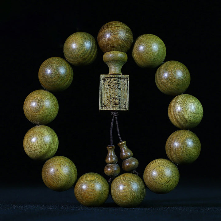 Braccialetto di cura in legno di sandalo verde tibetano Buddha Stones - image 1