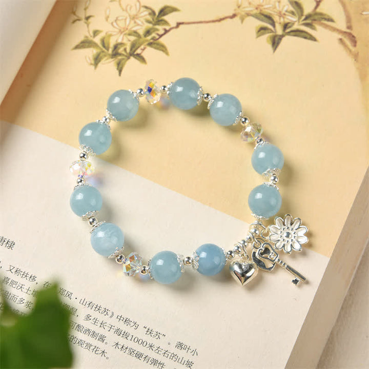 Bracciale con ciondolo a forma di chiave dell'amore con fiore di serenità in argento sterling 925 e acquamarina naturale Buddha Stones - image 1