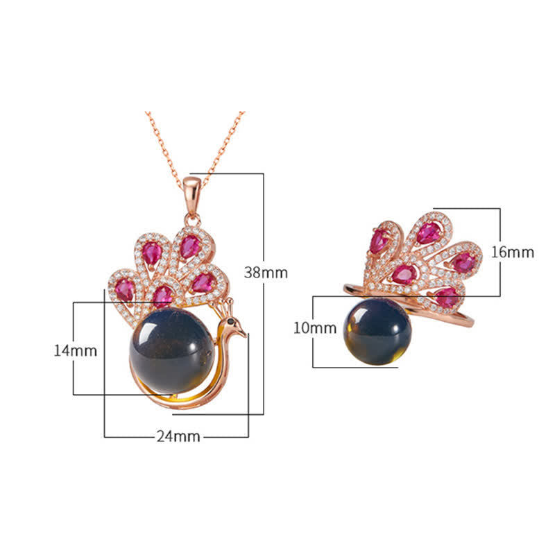 Collana con ciondolo e anello in ambra con pavone e amore e fortuna