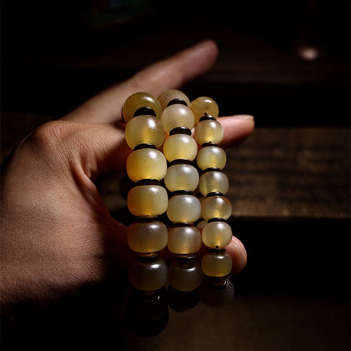 Braccialetto di auspicio Om Mani Padme Hum in corno di pecora tibetano fatto a mano con Buddha Stones