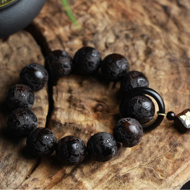 Braccialetto di equilibrio con zucca inciso con carattere cinese Yin Yang in legno di ebano Buddha Stones