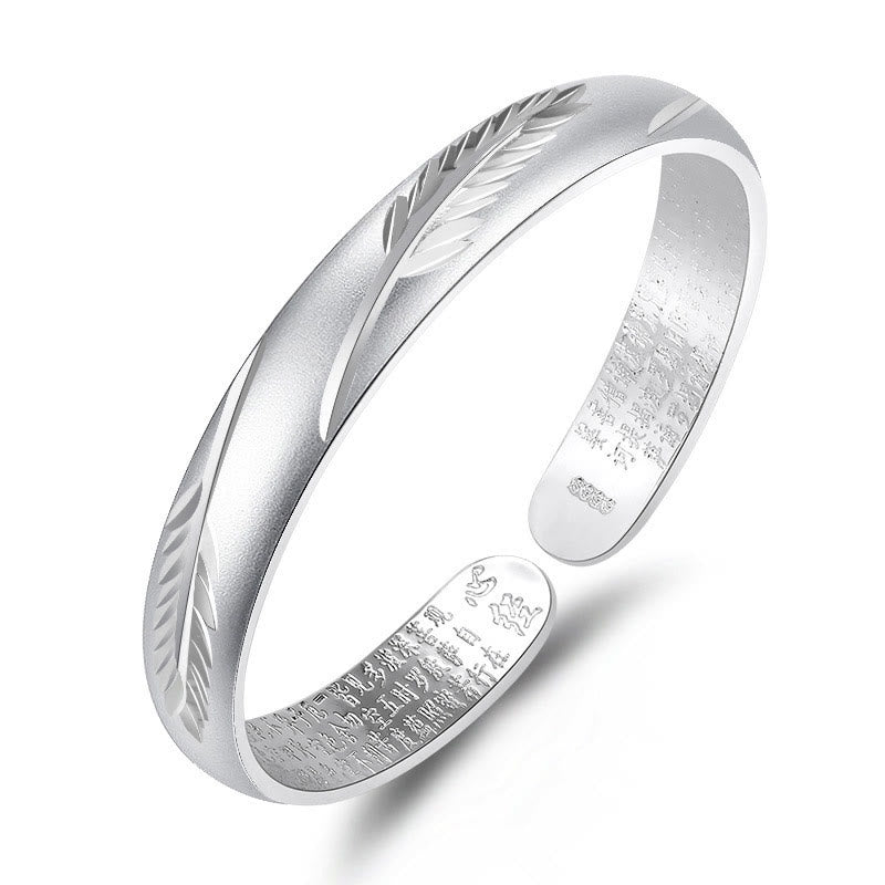 Bracciale rigido in rame con motivo inciso a forma di cuore con piume Buddha Stones, modello Wealth