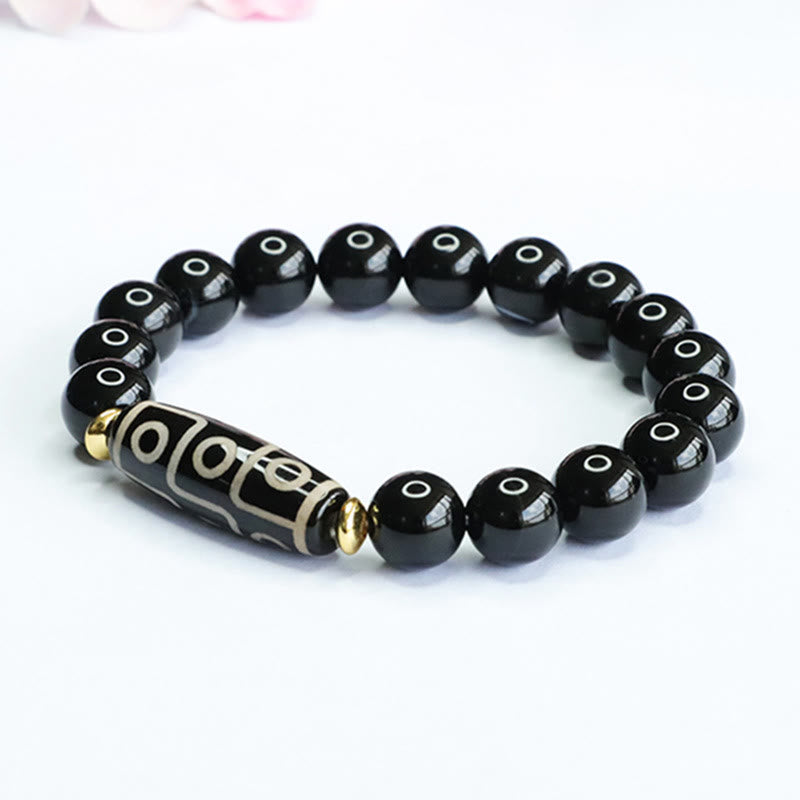 Braccialetto di potere in onice nero con perline Dzi tibetane a nove occhi Buddha Stones