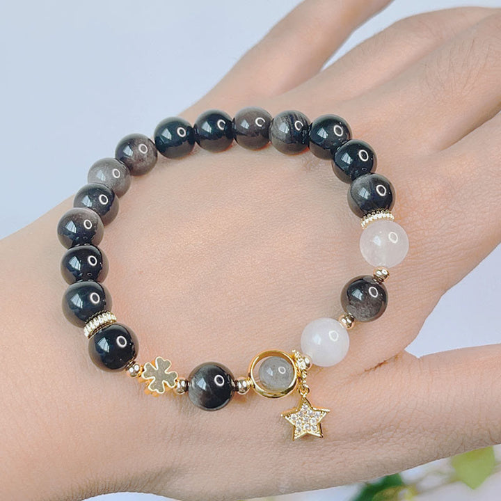 Braccialetto di protezione con cuore, stella e fiore in ossidiana naturale con Buddha Stones argento lucido