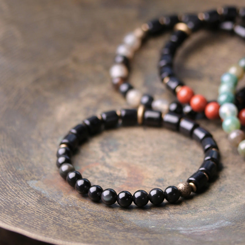 Braccialetto di coppia di pace in rame con Buddha Stones, legno di ebano, diaspro rosso, agata muschiata e cristallo