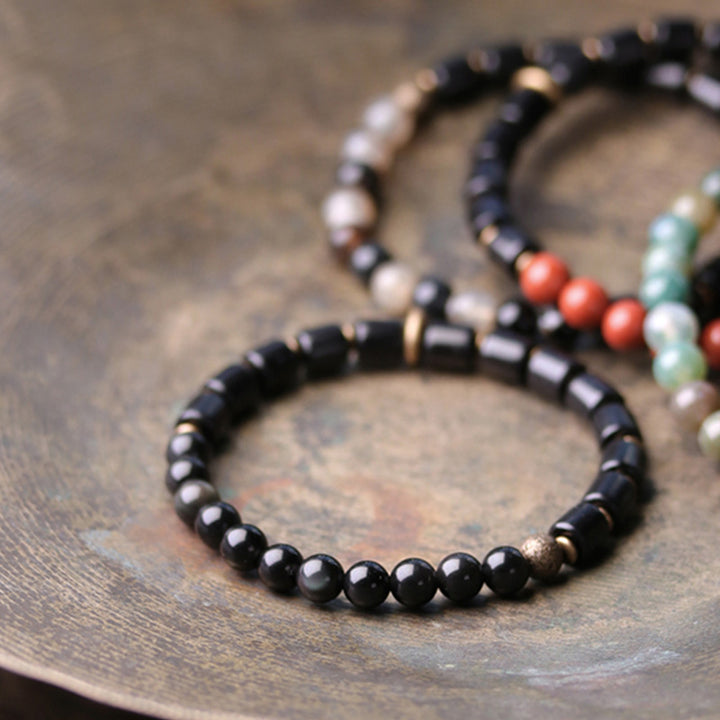 Braccialetto di coppia di pace in rame con Buddha Stones, legno di ebano, diaspro rosso, agata muschiata e cristallo