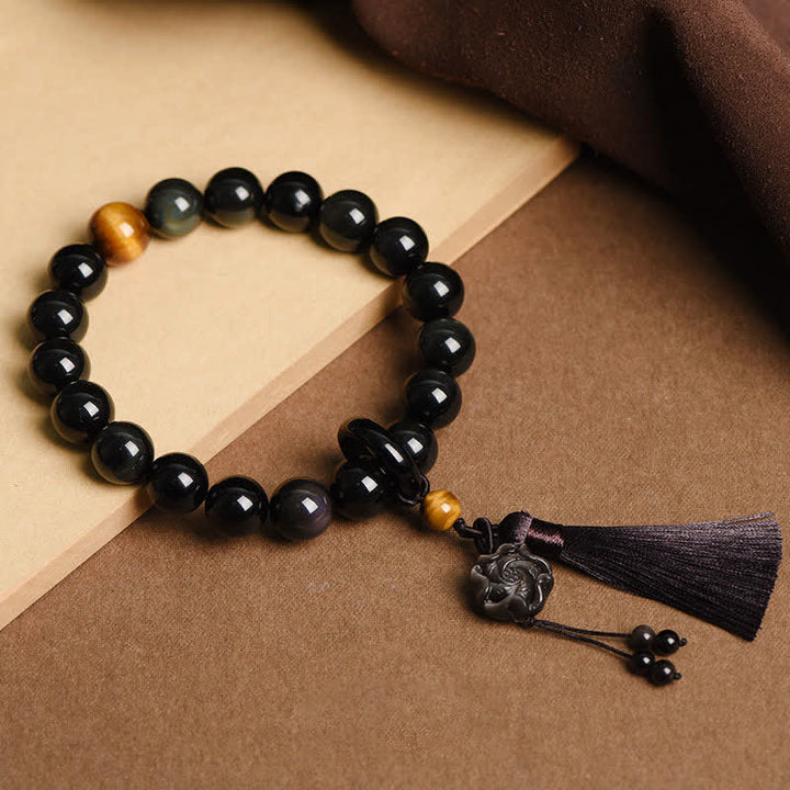 Buddha Stones Ossidiana nera naturale Leone Mala da polso Protezione Nappe Mala tascabile Decorazione per auto