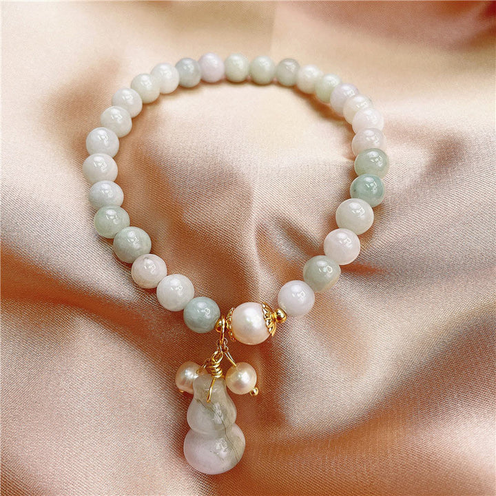 Braccialetto con ciondolo di protezione e benedizione in giada Buddha Stones