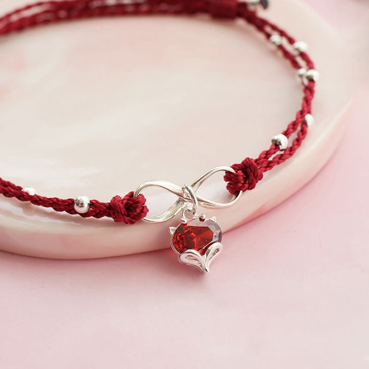 Cavigliera intrecciata con Buddha Stones, simbolo dell'amore, cuore e infinito
