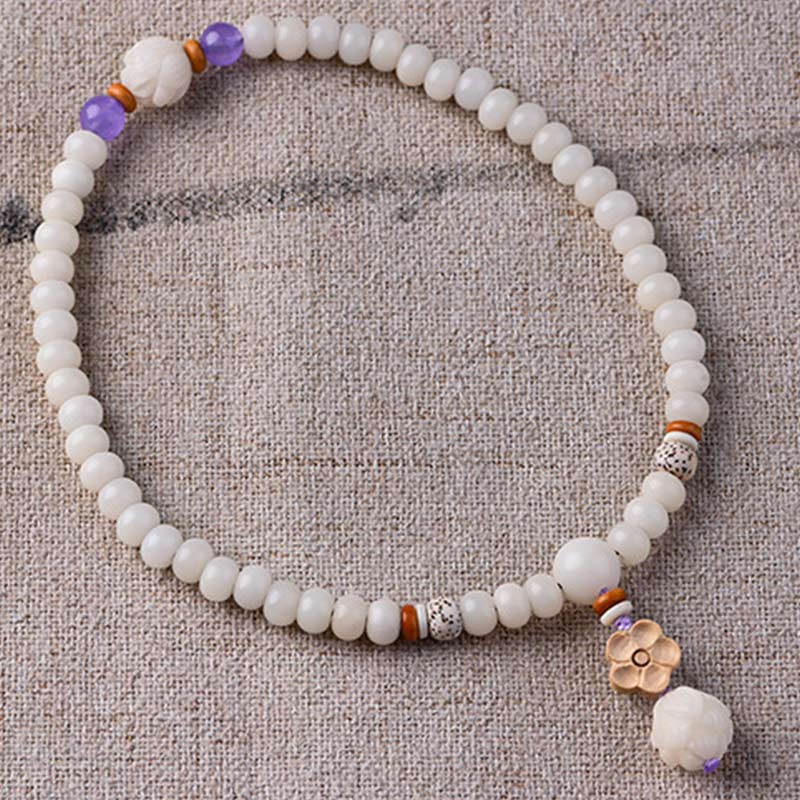 Braccialetto di benedizione del loto Bodhi in giada bianca tibetana Buddha Stones