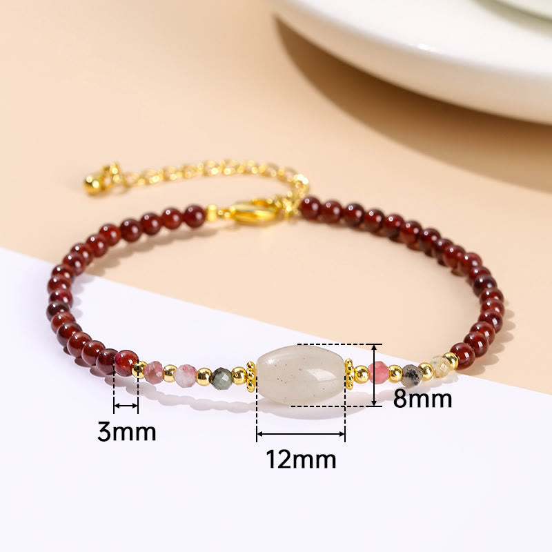 Bracciale Buddha Stones con perline di giada, tormalina e granato