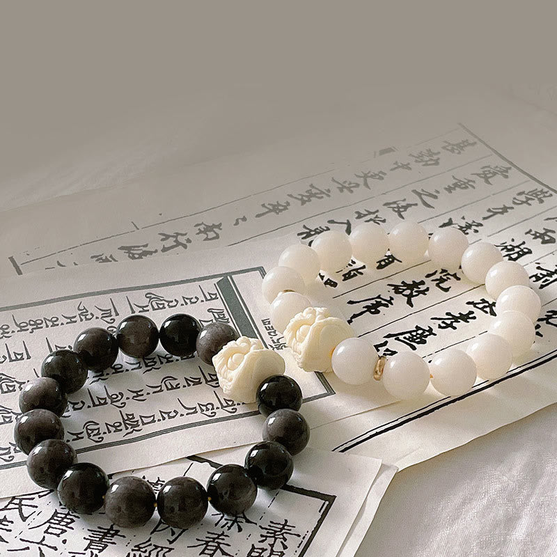 Braccialetto di protezione con leone danzante , Buddha Stones di avorio, seme di Bodhi, pietre di Buddha, argento lucido e ossidiana