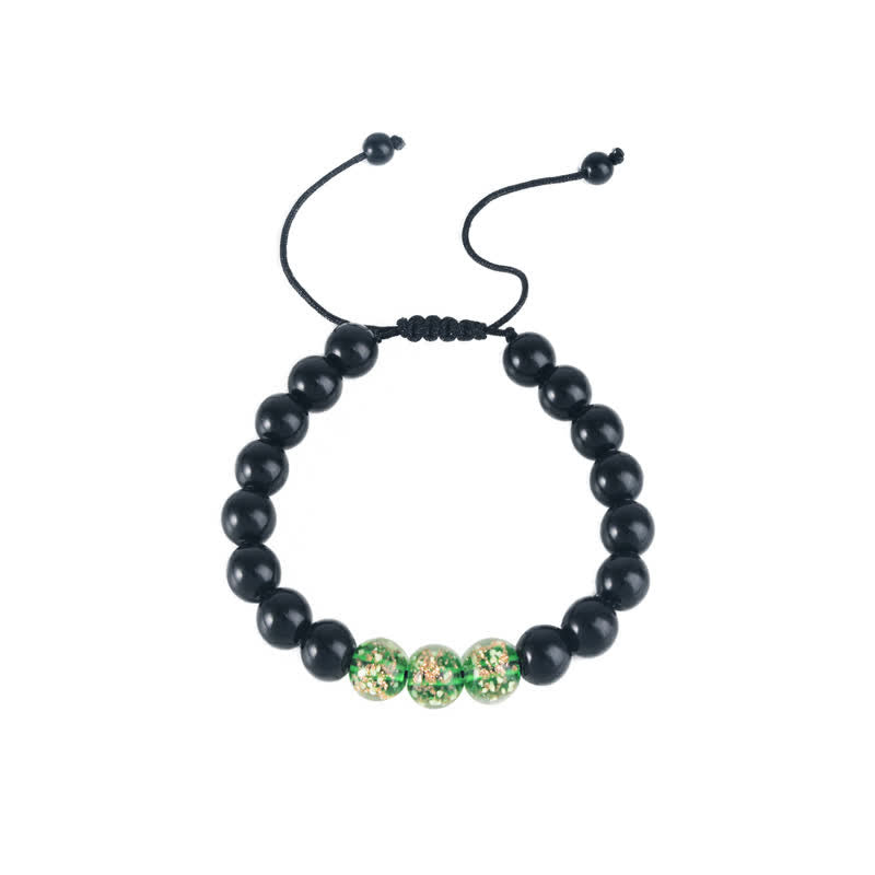 Braccialetto di forza in pietra luminosa con ossidiana nera Buddha Stones