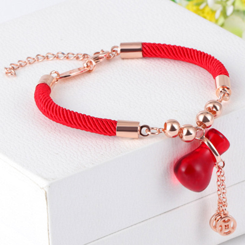 Braccialetto Buddha Stones Wealth Attractor con corda rossa e agata rossa