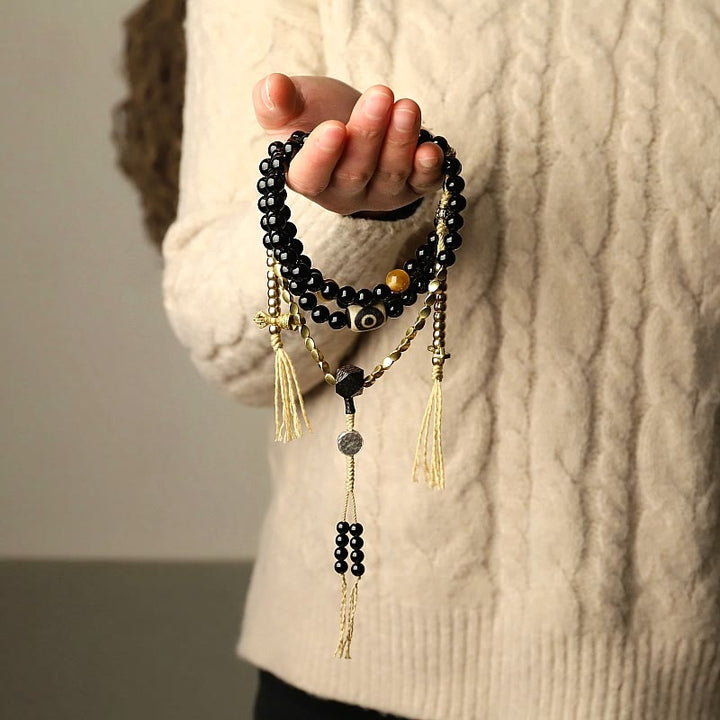 Buddha Stones Tibetano 108 Mala Beads Onice Nero Tre Occhi Dzi Beads Bracciale di Protezione - image 1