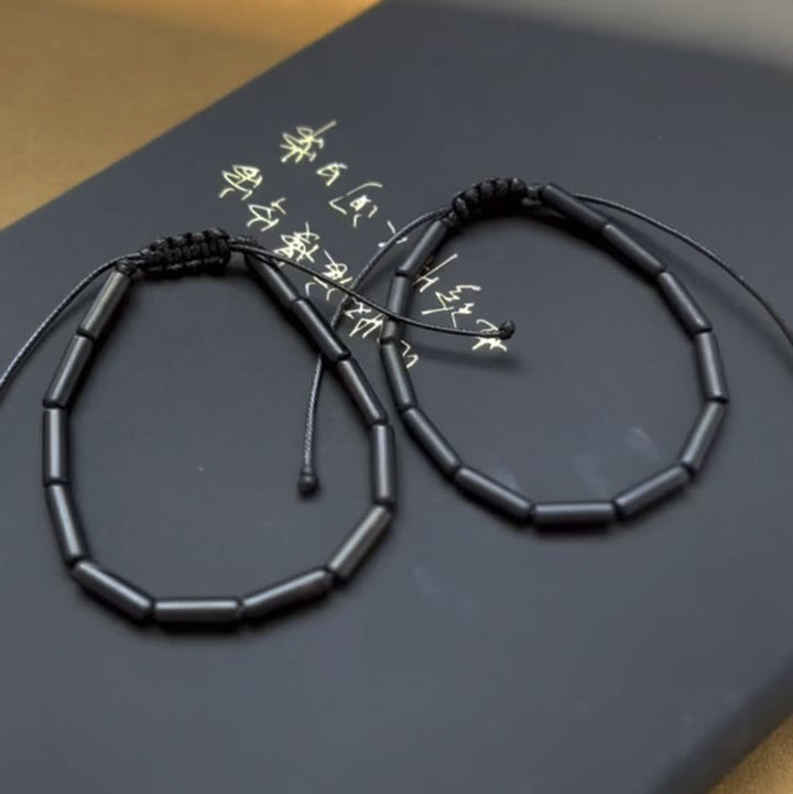 Braccialetto di protezione e supporto con perline di onice nero Buddha Stones