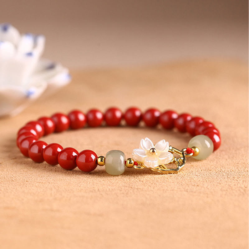 Braccialetto di benedizione con fiore di pietra di tridacna con perline di giada naturale di cinabro Buddha Stones