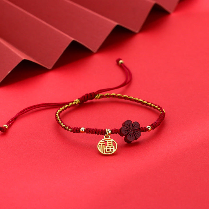 Braccialetto intrecciato con corda e carattere Fu, fiore di cinabro e Buddha Stones