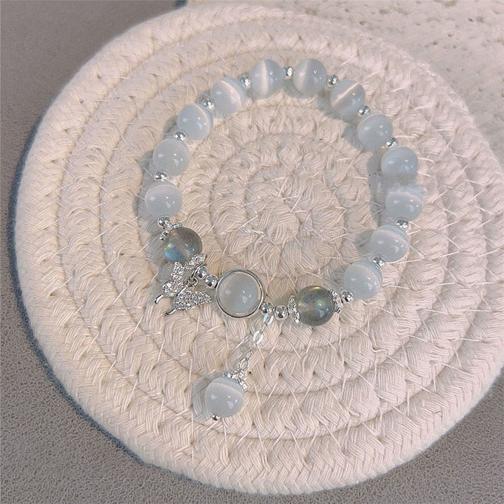 Braccialetto di supporto con ciondolo a forma di stella a forma di farfalla, pietra di luna e occhio di gatto Buddha Stones - image 4