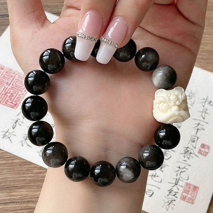 Braccialetto di protezione con leone danzante , Buddha Stones di avorio, seme di Bodhi, pietre di Buddha, argento lucido e ossidiana