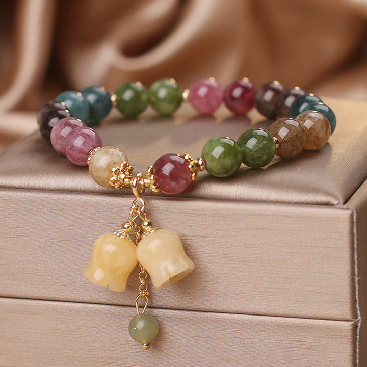 Braccialetto dell'amore con perline di fiori di tormalina colorata naturale Buddha Stones