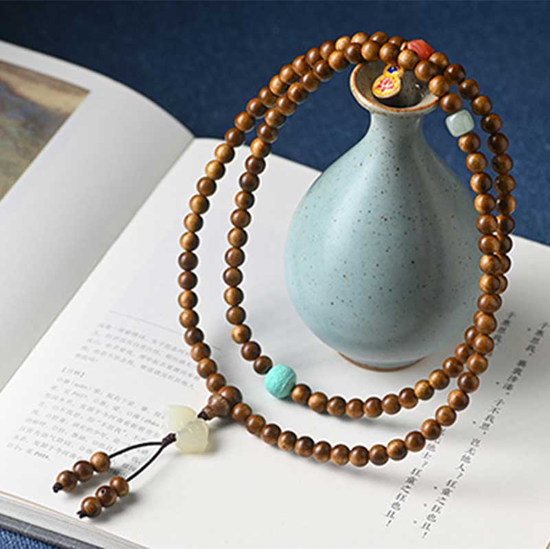 Braccialetto di protezione e calma in palissandro tibetano Buddha Stones Mala