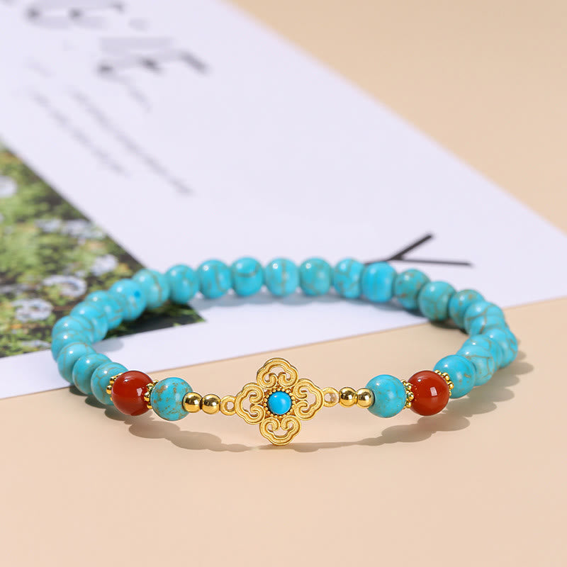 Braccialetto di protezione dell'equilibrio con perline turchesi Buddha Stones