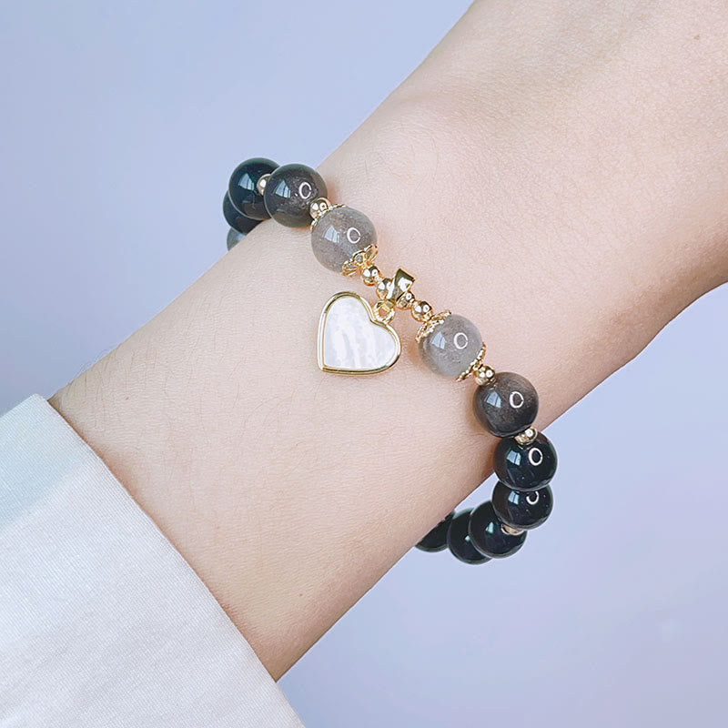 Braccialetto di protezione con cuore, stella e fiore in ossidiana naturale con Buddha Stones argento lucido