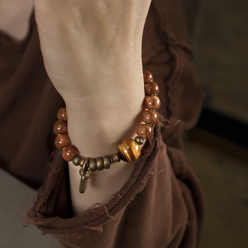 Braccialetto per la fortuna, in ottone, rame e ossidiana , Buddha Stones , semi di Kuka, occhio di tigre e oro lucido - image 4