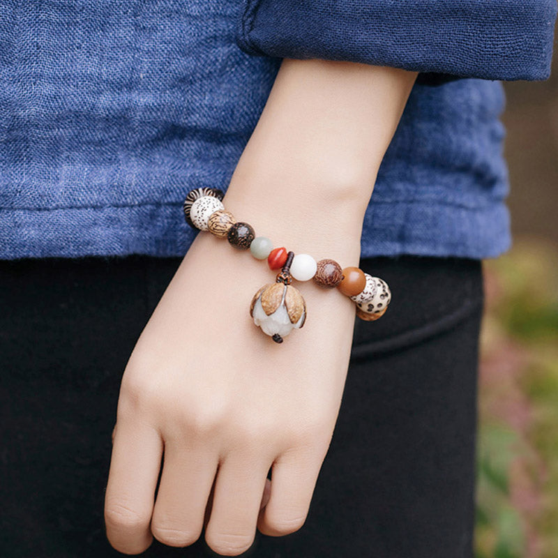 Bracciale Mala da polso Buddha Stones, semi di Bodhi, loto, saggezza, pace