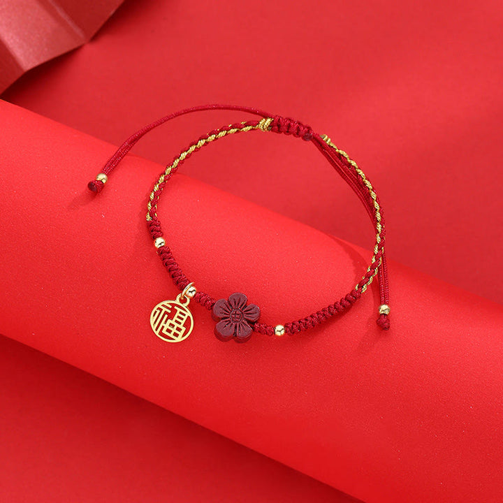 Braccialetto intrecciato con corda e carattere Fu, fiore di cinabro e Buddha Stones