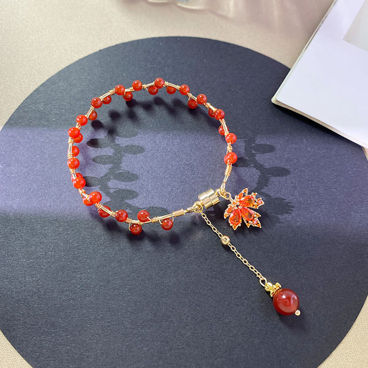 Braccialetto portafortuna con foglia d'acero rosso Buddha Stones
