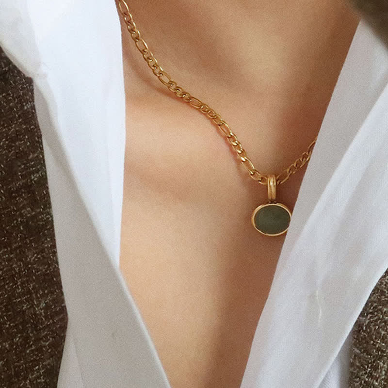 Collana con ciondolo in acciaio al titanio con resistenza turchese ovale