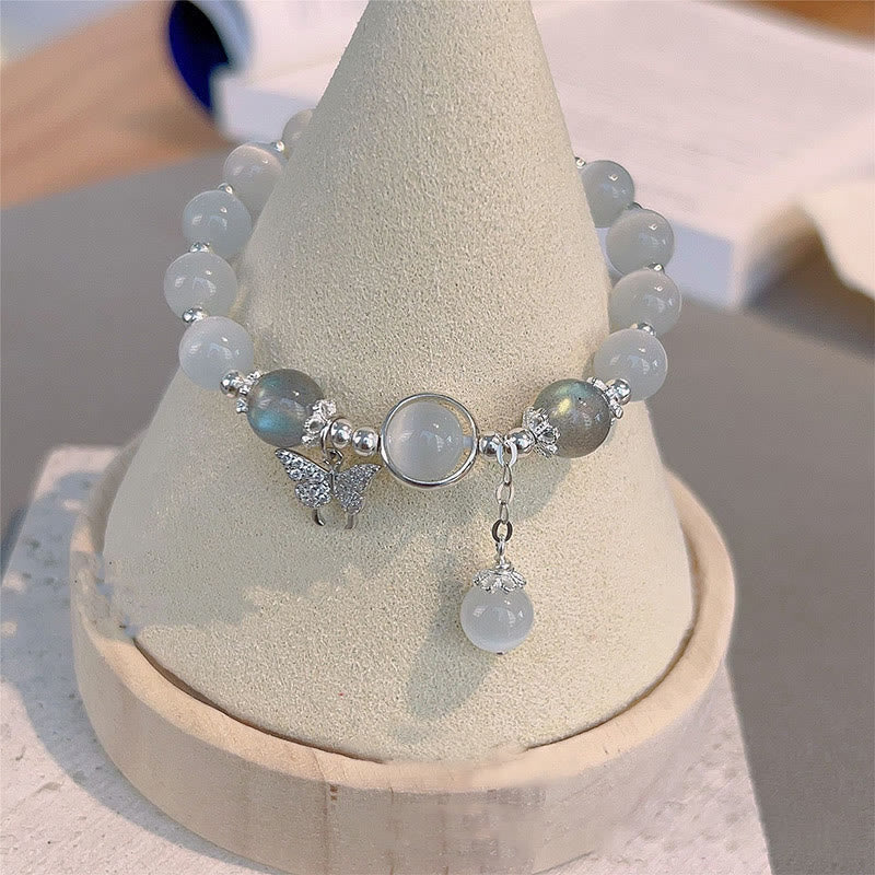 Braccialetto di supporto con ciondolo a forma di stella a forma di farfalla, pietra di luna e occhio di gatto Buddha Stones - image 1