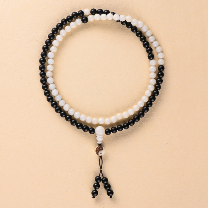 Collana Mala con protezione YinYang in ebano e Buddha Stones