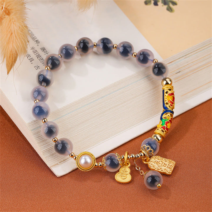 Braccialetto di forza con amuleto in agata blu caramella naturale Buddha Stones