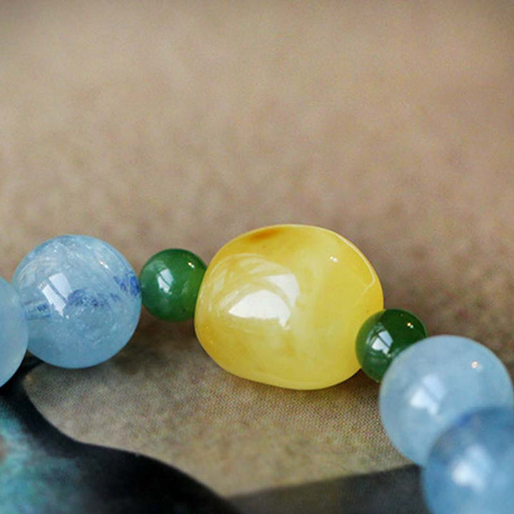 Braccialetto di guarigione della serenità con perle di ambra e acquamarina naturale