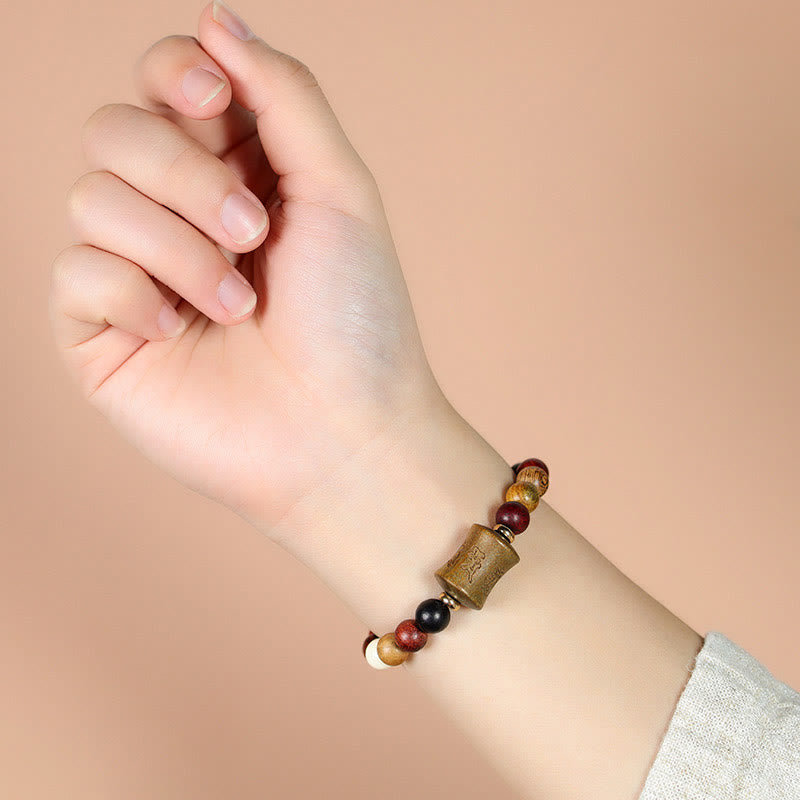 Braccialetto di protezione multicolore in legno di sandalo tibetano Om Mani Padme Hum