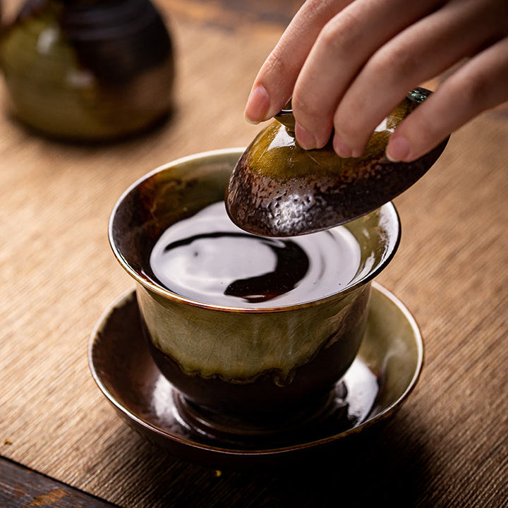 Buddha Stones Vintage Brown Kiln Change Design Porcellana Ceramica Gaiwan Sancai Tazza da tè Kung Fu Tazza da tè e piattino con coperchio