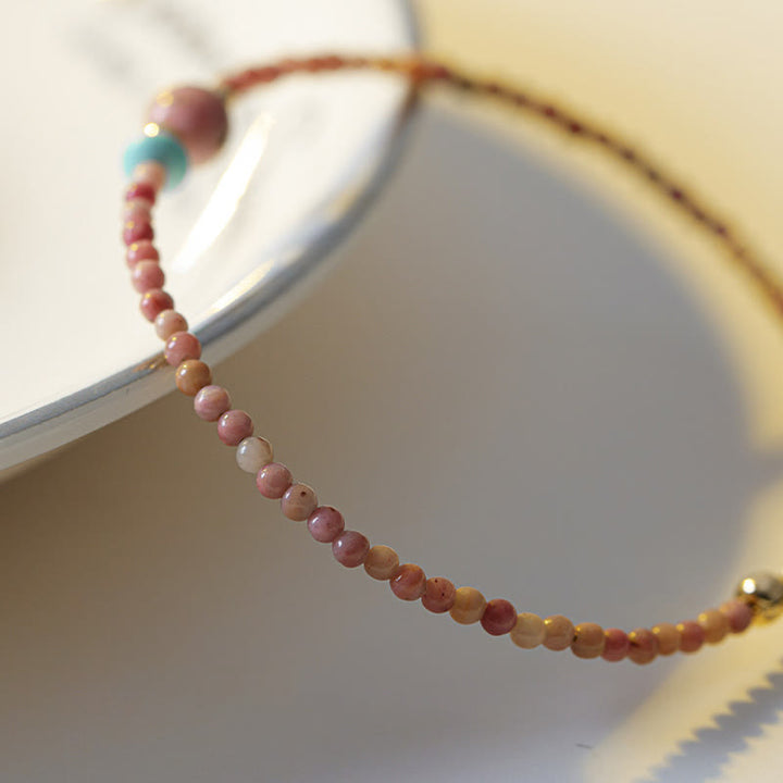 Bracciale a catena con energia amorevole in rodonite naturale placcato oro 14K Buddha Stones