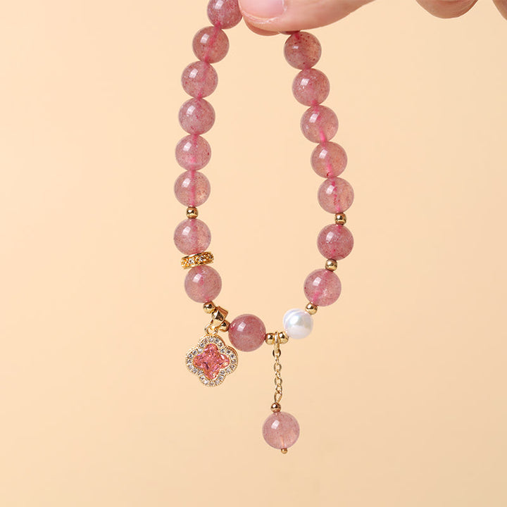 Braccialetto di guarigione con ciondolo a forma di quadrifoglio, perla e quarzo fragola Buddha Stones